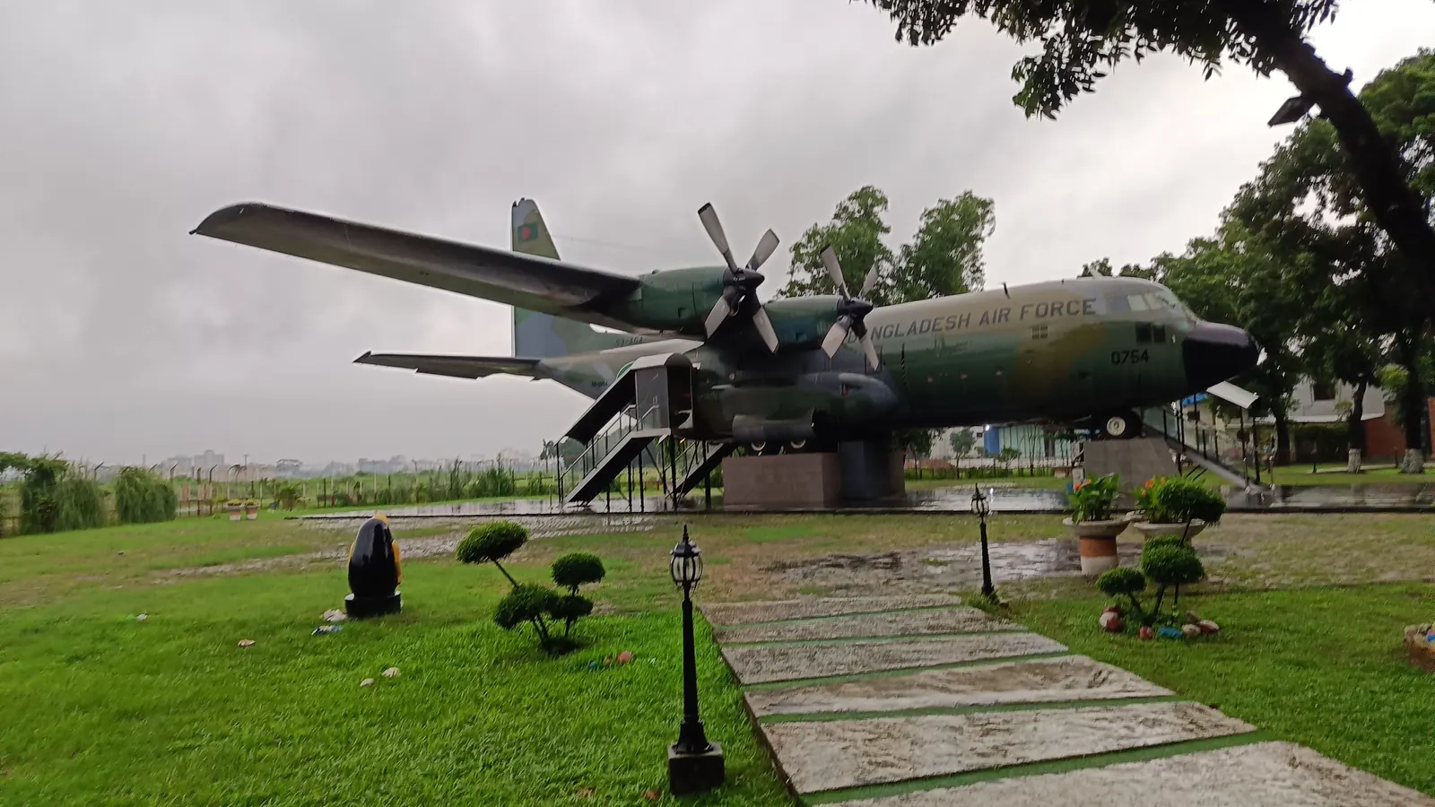 A retired Bangladesh Air Force transport plane parked on the museum lawn